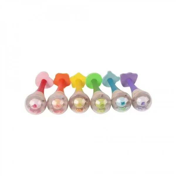 Set of colourful baby maracas on a white background