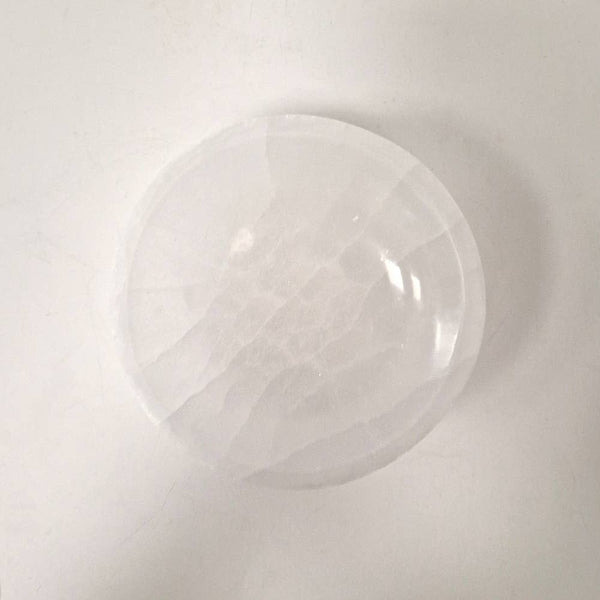 White crystal bowl on a white background