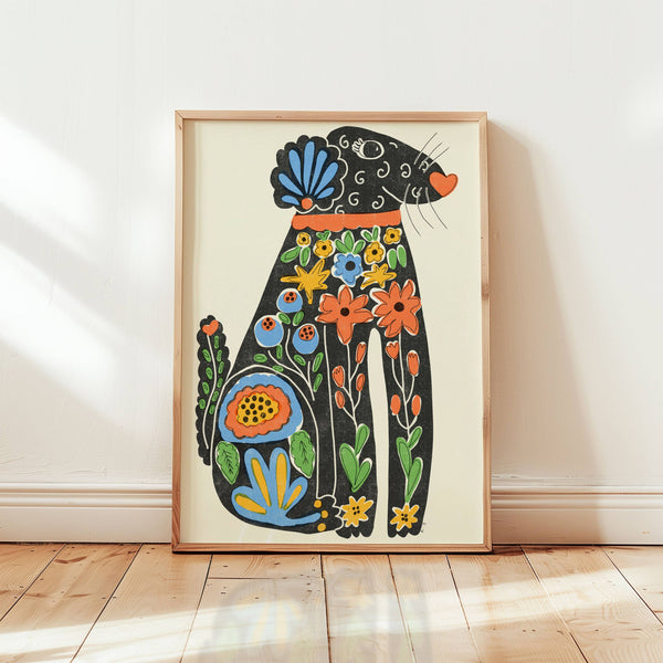 Framed artwork of a stylised dog with floral patterns on a white wall.