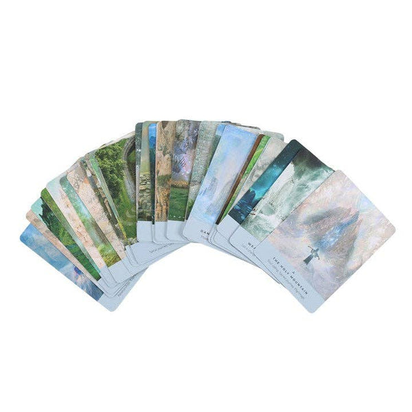 Set of scenic cards fanned out on a white background