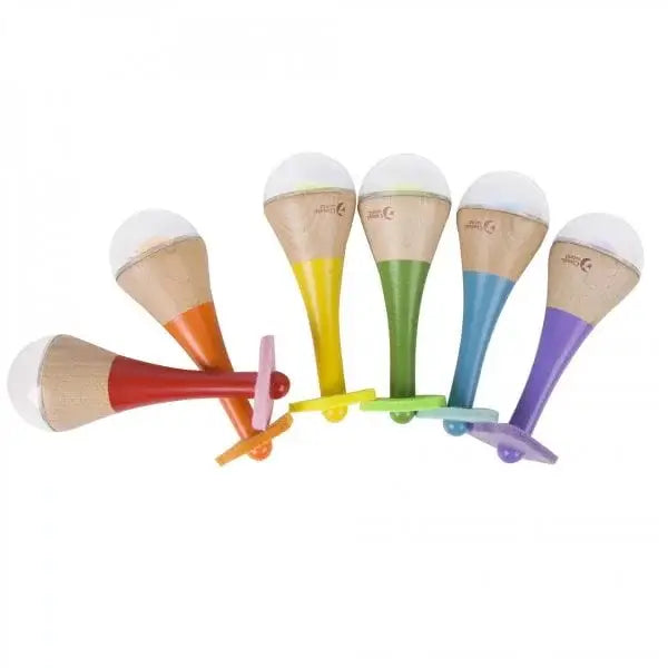 Set of colourful wooden maracas with different coloured bases on a white background