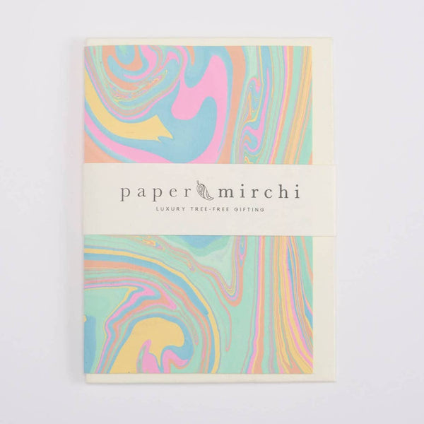 Greeting card with colourful marbled design and 'paper mirchi' branding on a white background