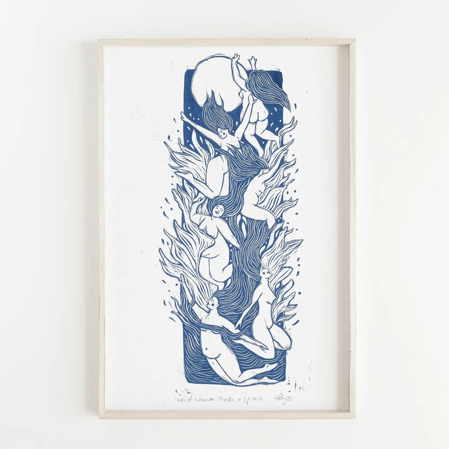 Framed print of women in the sea in moonlight