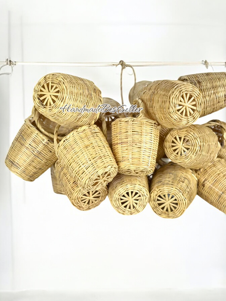 Collection of mini woven basket decorations on a white background