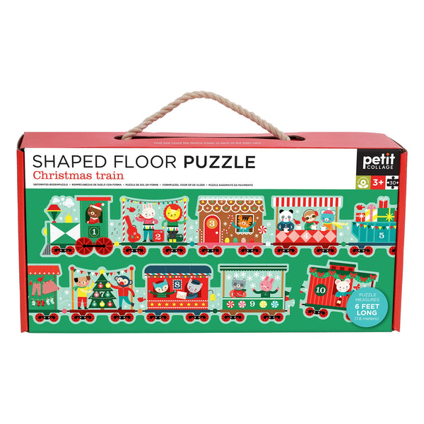 Shaped floor puzzle packaging for a Christmas train themed puzzle by Petit Collage.