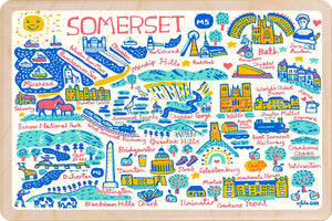 Colourful illustration of Somerset with various landmarks and attractions.