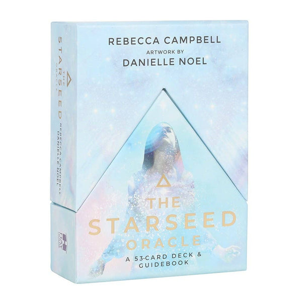 The Starseed Oracle packaging with a triangular design and artwork by Danielle Noel on a light blue background.