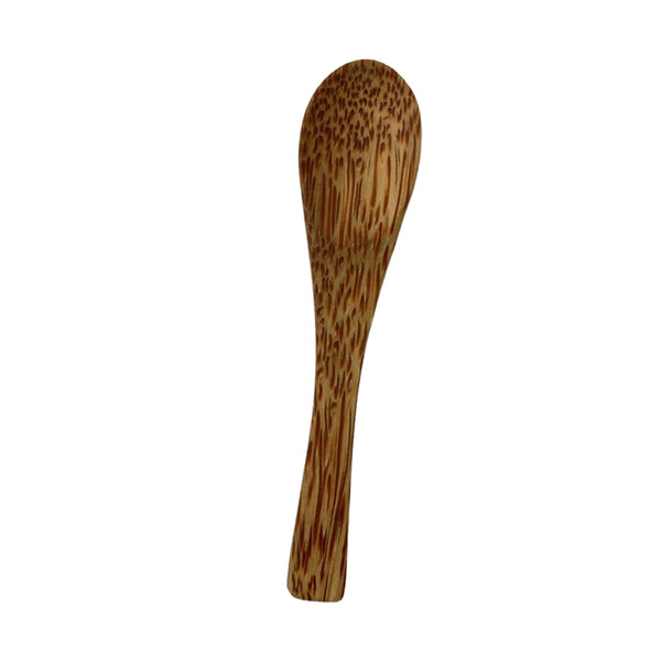 Wooden spoon on a white background
