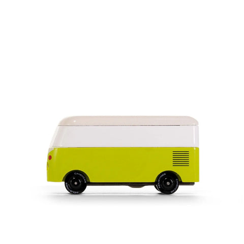Small vehicle model with a white top and green body on a white background