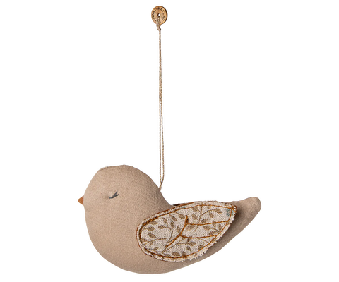 Decorative bird ornament with tree branch detail on a white background