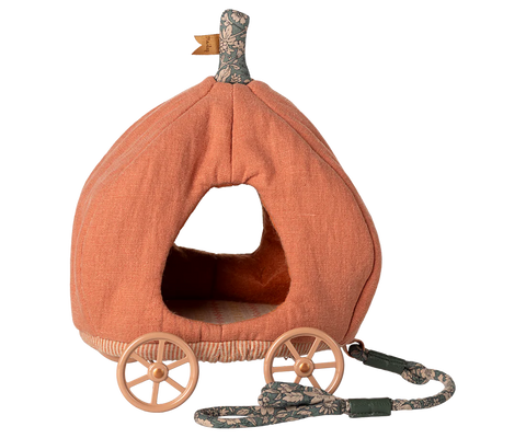 Pumpkin-shaped fabric carriage with wheels and a handle on a white background