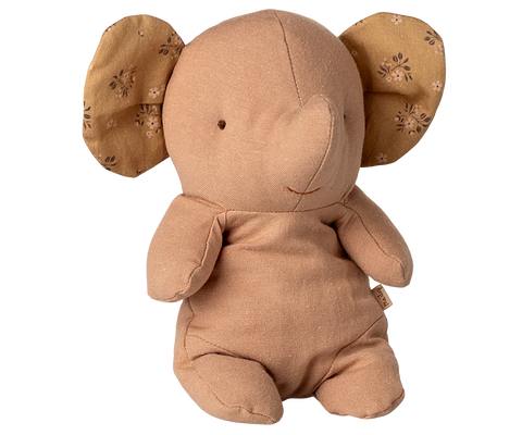 Powder plush elephant toy with floral ears on a white background