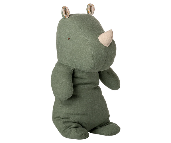 Green rhino plush toy on a white background
