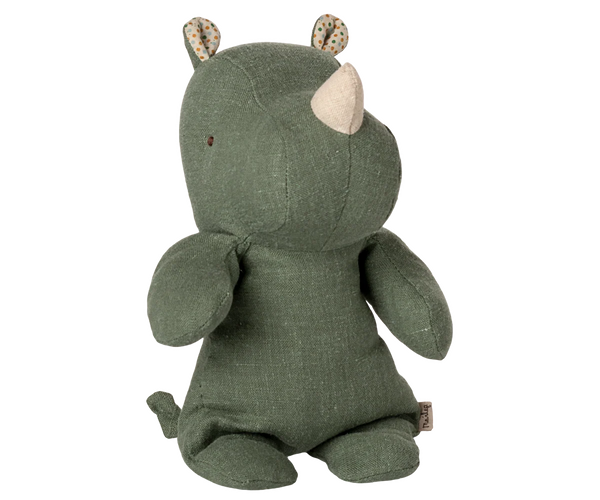 Green plush toy with animal ears on a white background