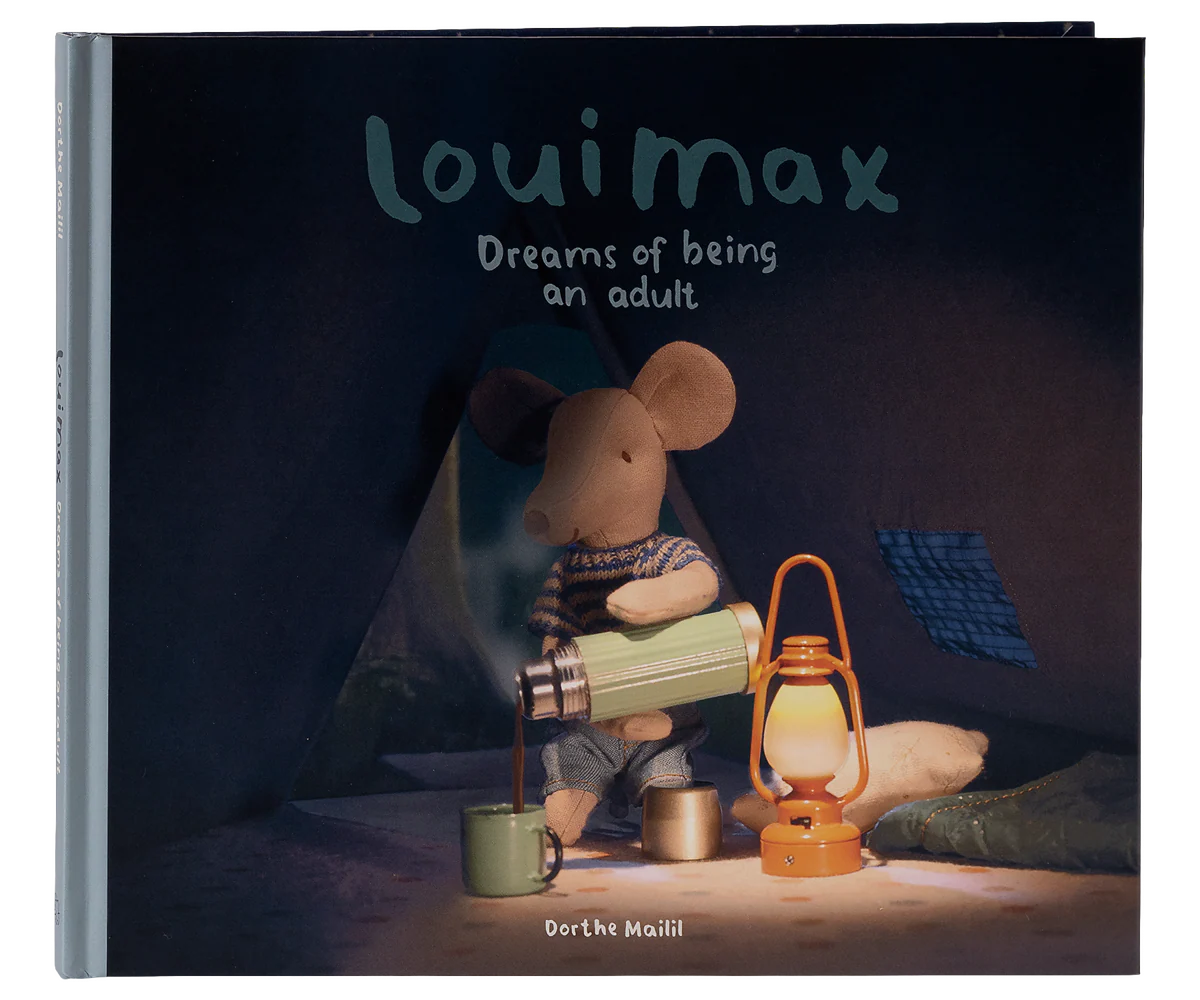 Book titled 'Louimax Dreams of Being an Adult' with a mouse character holding a lantern and a cup.