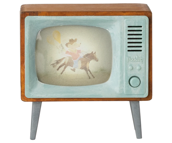 Vintage-style television with a horse and rider on the screen