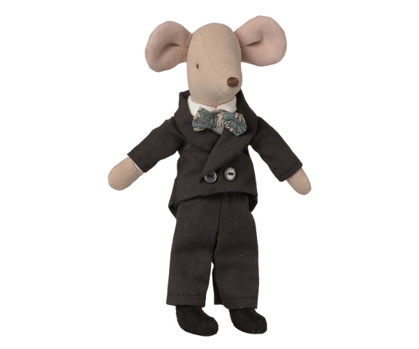 Stuffed toy mouse in a dark suit with a bow tie on a white background