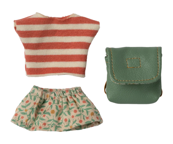 Striped shirt, floral skirt, and green pouch on a white background