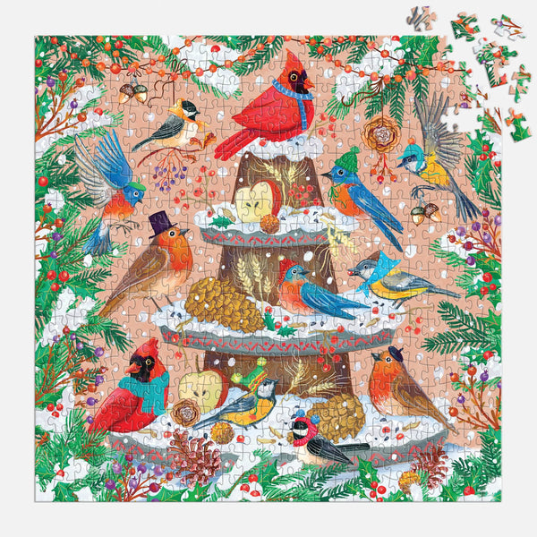 Jigsaw puzzle with colourful birds and a cake design on a white background