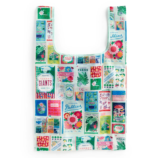 Reusable shopping bag with colourful plant seed packet designs on a white background
