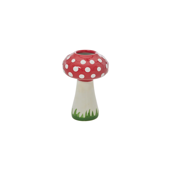 Mushroom-shaped vase with red polka dot cap on a white background