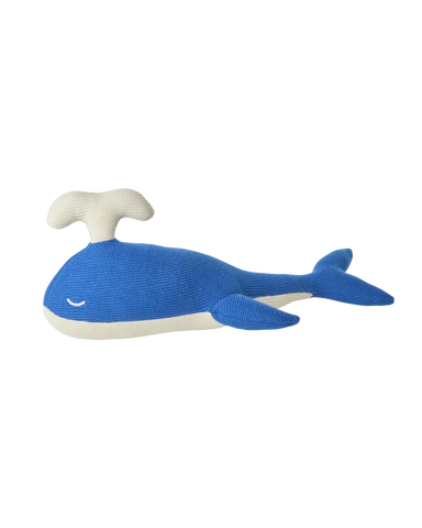 Blue whale-shaped toy on a white background
