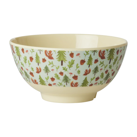 Bowl with nature-themed pattern on a white background
