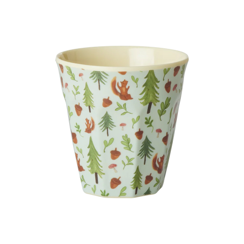Cup with forest pattern on a white background