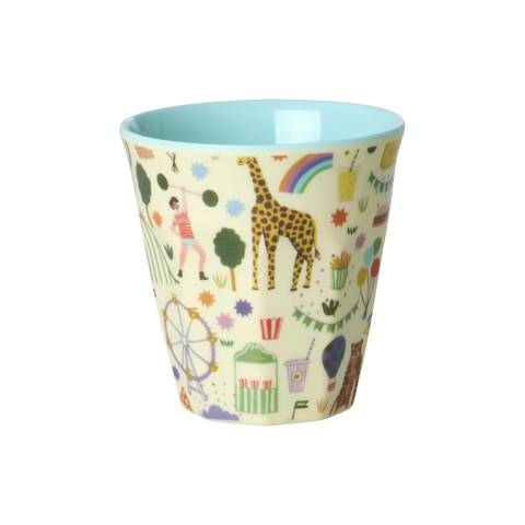 Children's cup with colourful animal and object pattern on a white background