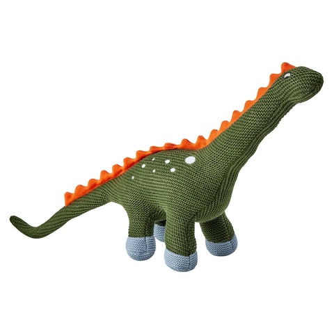 Knitted dinosaur toy with green body, orange spikes, and blue feet on a white background