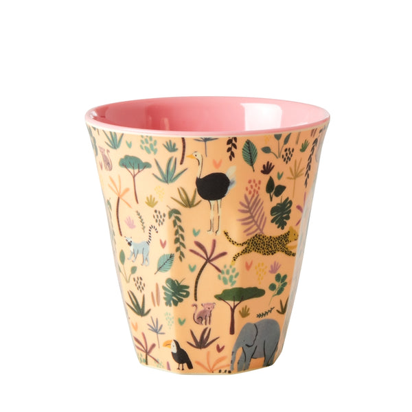 Children's cup with animal and plant pattern on a white background