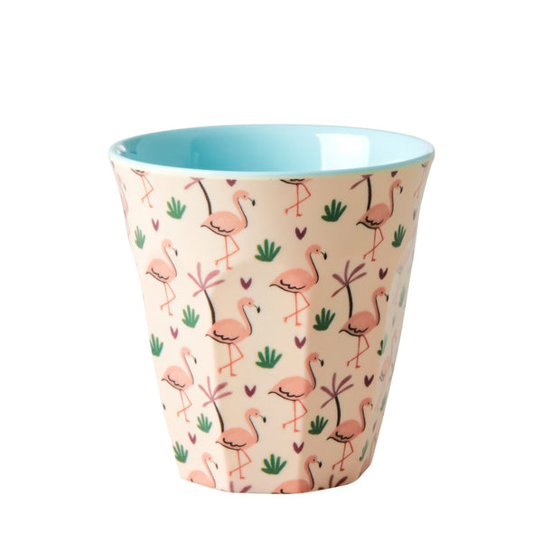 Ceramic cup with flamingo pattern on a white background