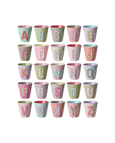 Set of 25 pink and lilac floral colourful cups with letters A to Z on a white background 