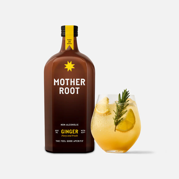Bottle of 'Mother Root' non-alcoholic ginger drink with a glass of the drink on a white background