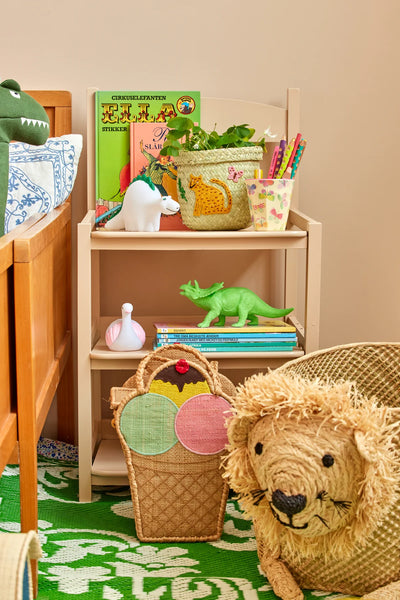 Extra Small Leopard Embroidery Round Raffia Storage Basket in a lifestyle setting- Rice DK