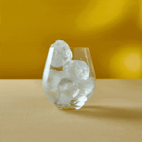animated gif of a glass containing ice cubes filling up with a drink