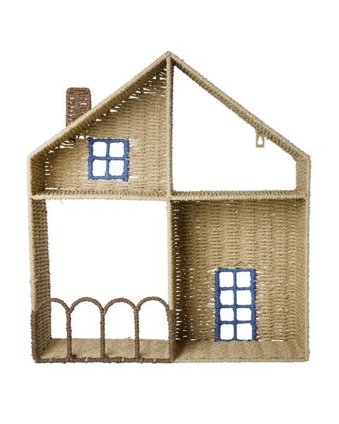 Woven house-shaped shelf with blue window panes on a white background