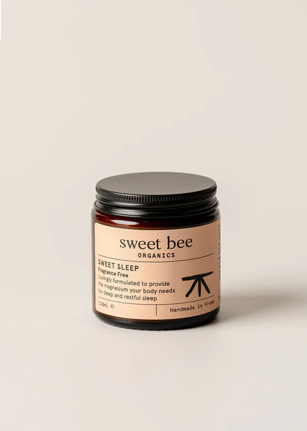 Jar of 'sweet bee' sleep product on a beige background