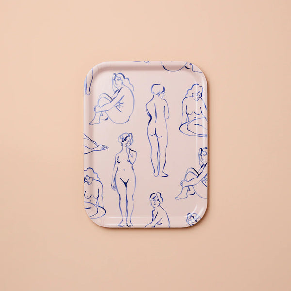 Rectangular tray featuring blue line art women against a blush background