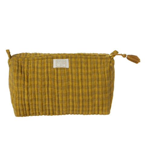 Yellow textured pouch with a label on a white background