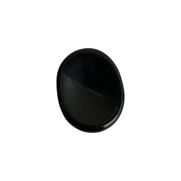 Black obsidian stone on a white background
