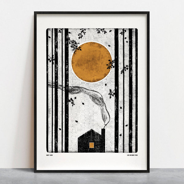 Framed artwork with a minimalist design of a house and sun against a white wall.