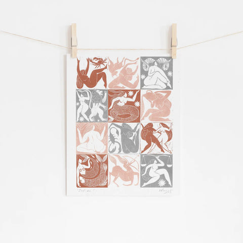 Print of zodiac signs in a grid pattern on a white background
