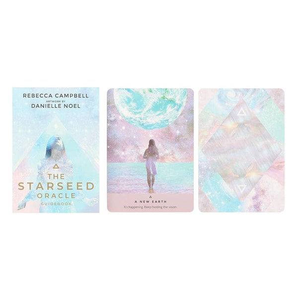 Starseed Oracle book and cards with pastel designs on a white background