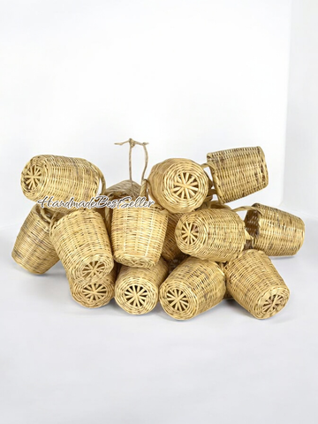 Stack of mini wicker basket decorations on a white background