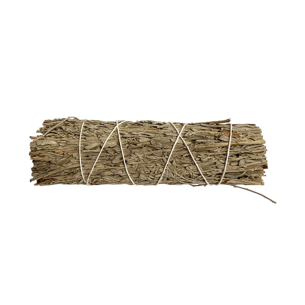 Bundled sage stick on a white background