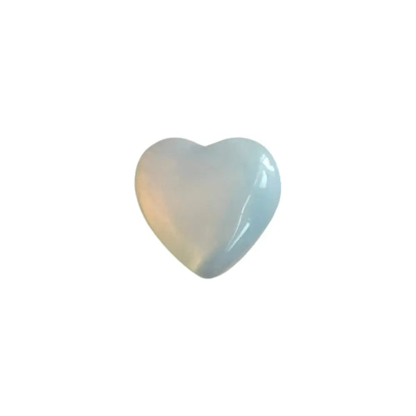 Heart-shaped opalite crystal on a white background