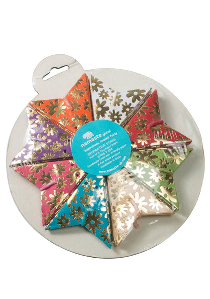 Colorful folded star decorations in a package on a white background with a visible brand label.