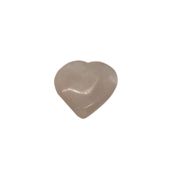 Heart-shaped rose quartz crystal on a white background