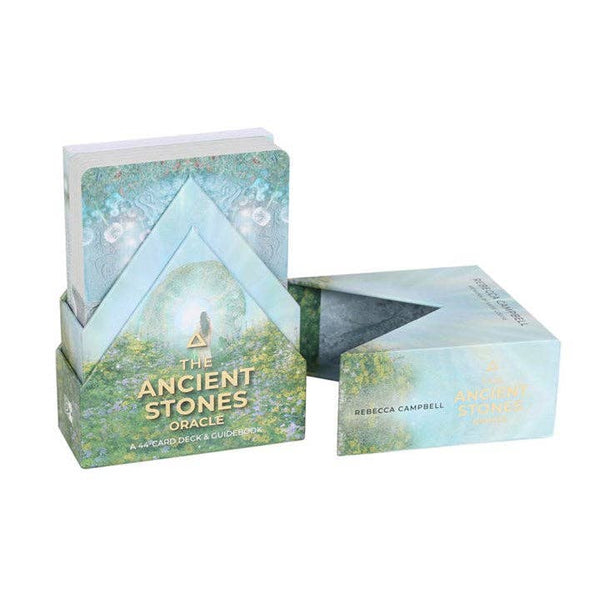 Card deck packaging with pyramid design and nature-themed illustration on a white background